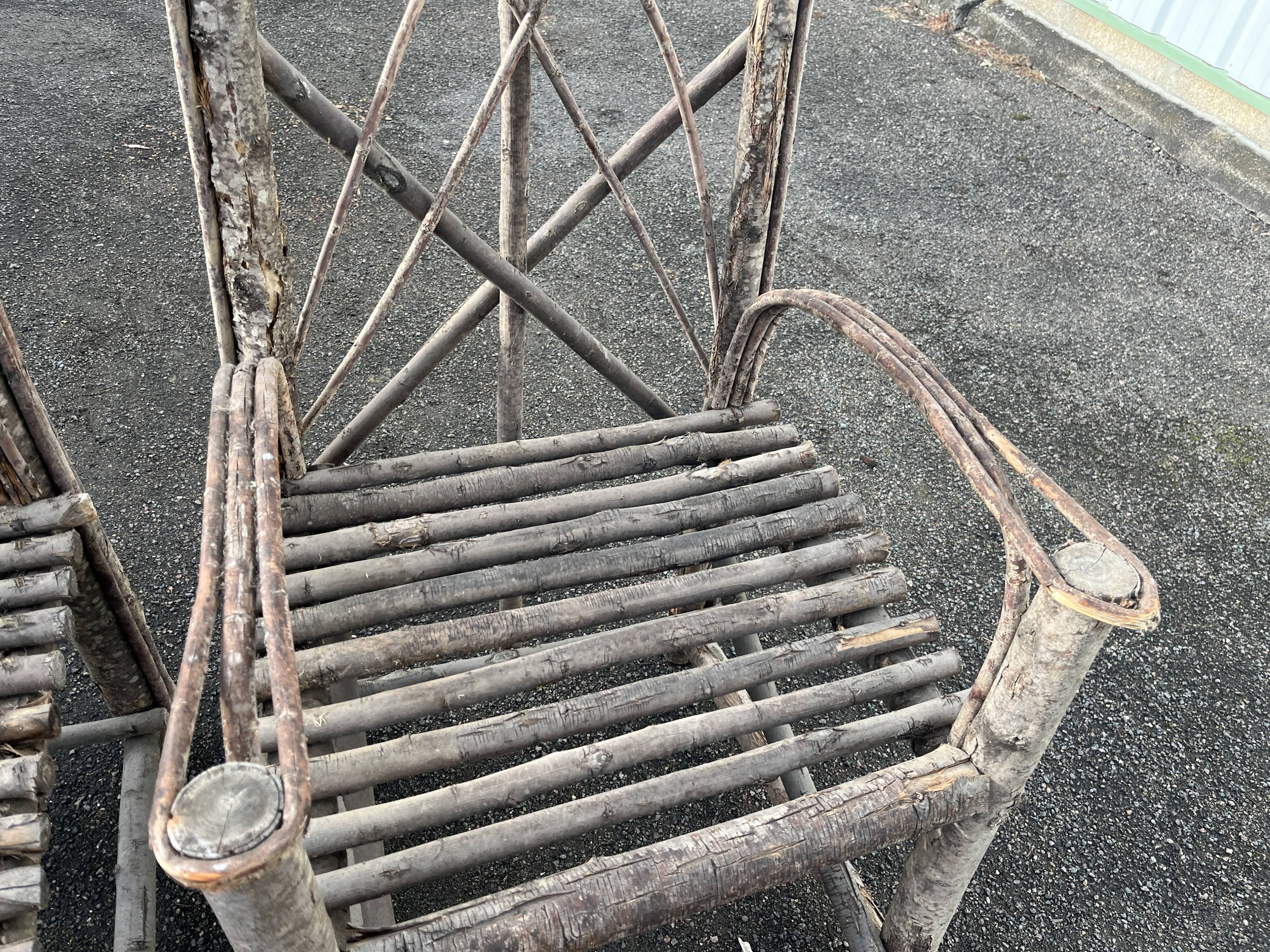 Pair of rustic natural wood armchairs
