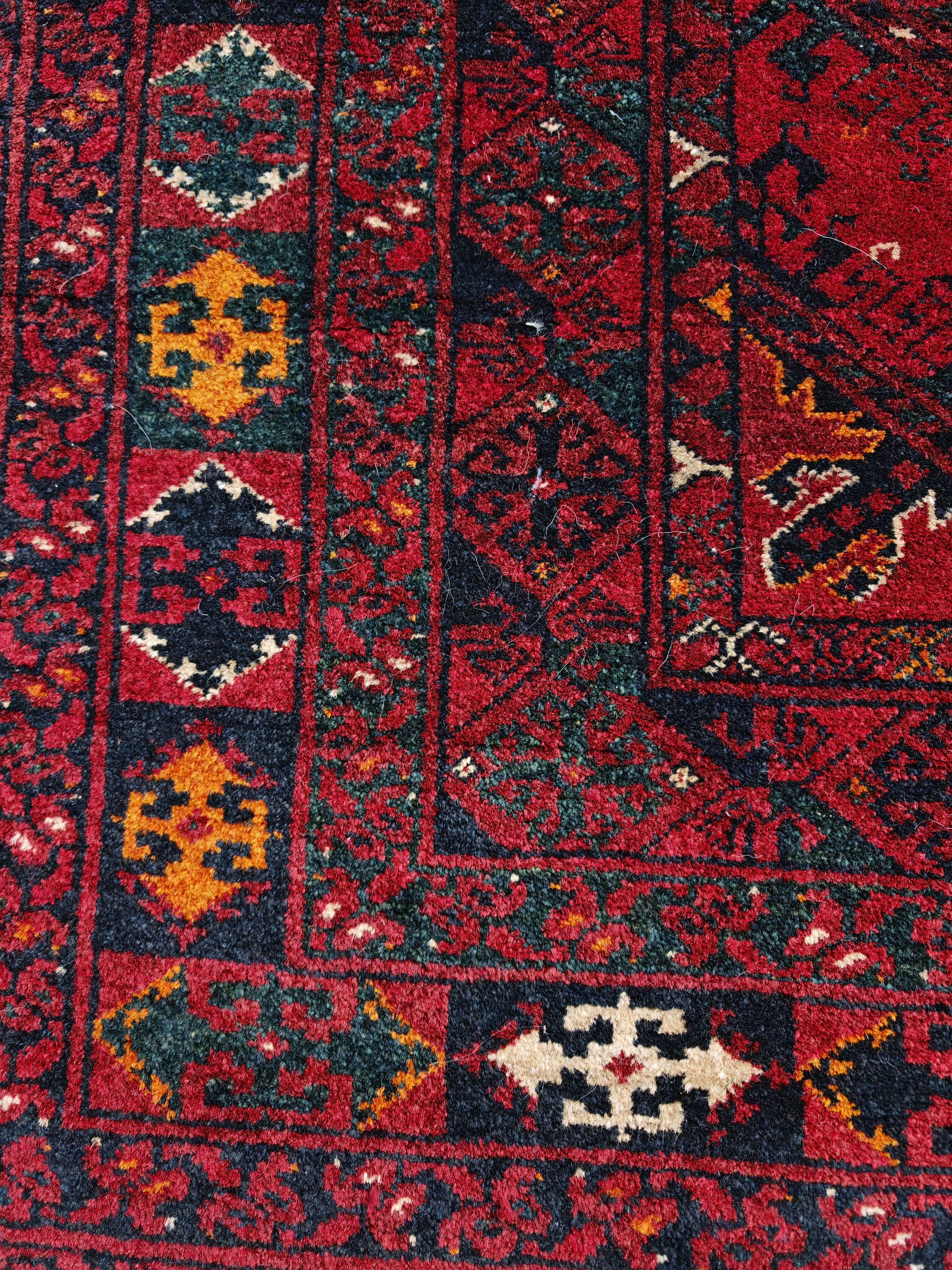Vintage hand-knotted Kunduz rug, natural dyes, 1940s.