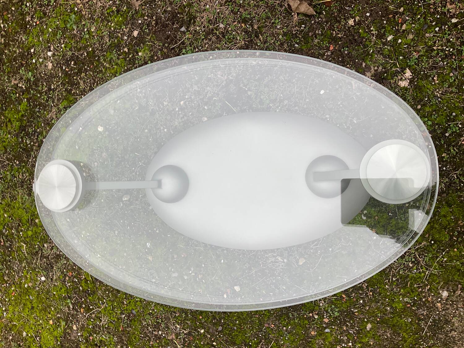 Naos designer coffee table in tempered glass and cast iron