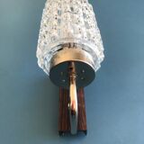 Round wall lamp in molded glass
