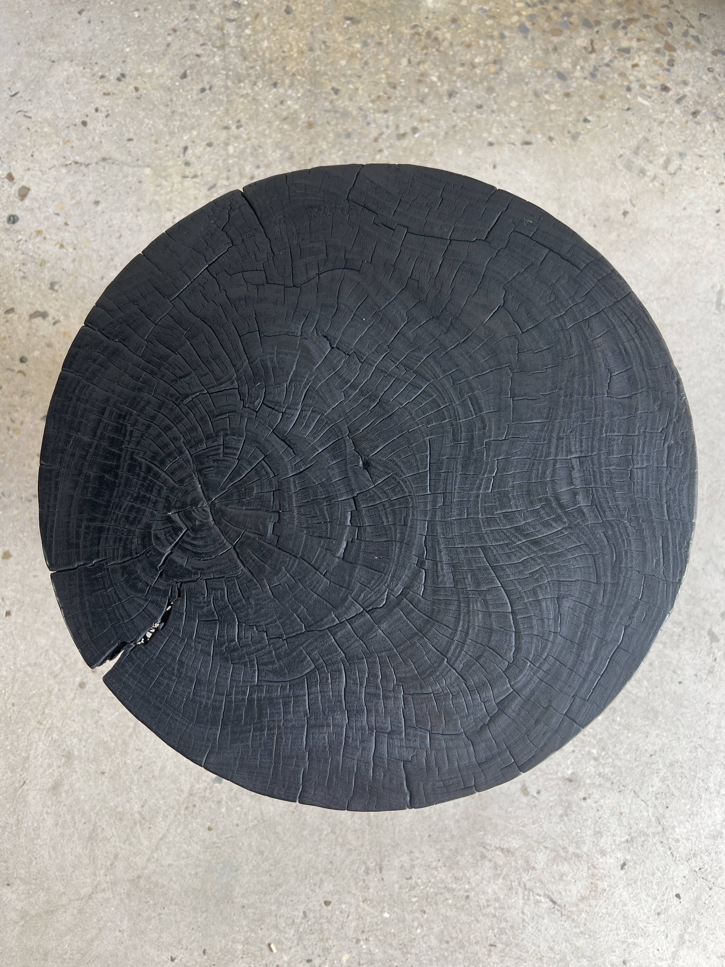 Solid wood (monoxyl) side table, organic shape, black color