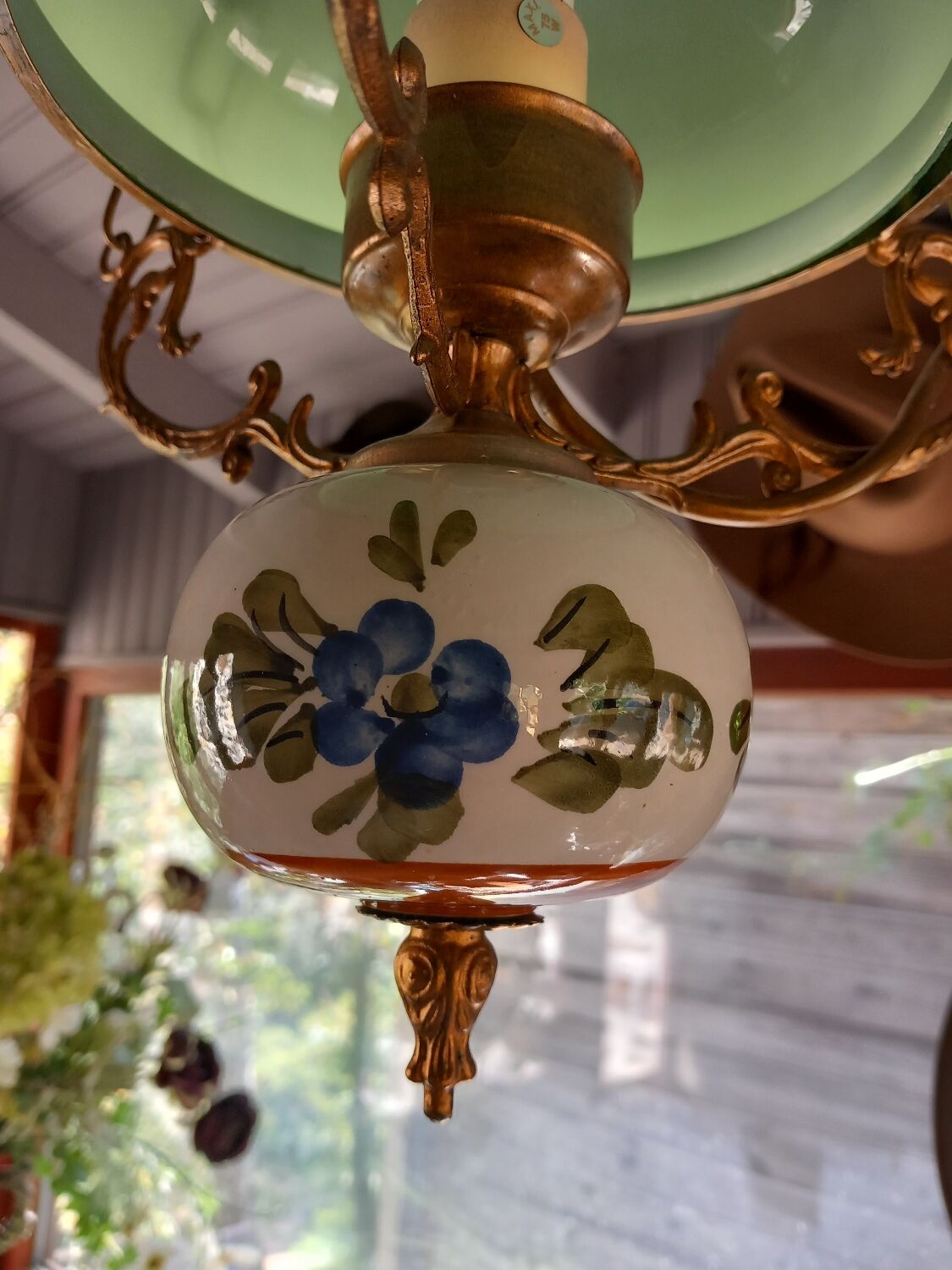 Old green opaline chandelier, gold metal and earthenware