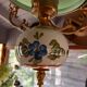 Old green opaline chandelier, gold metal and earthenware