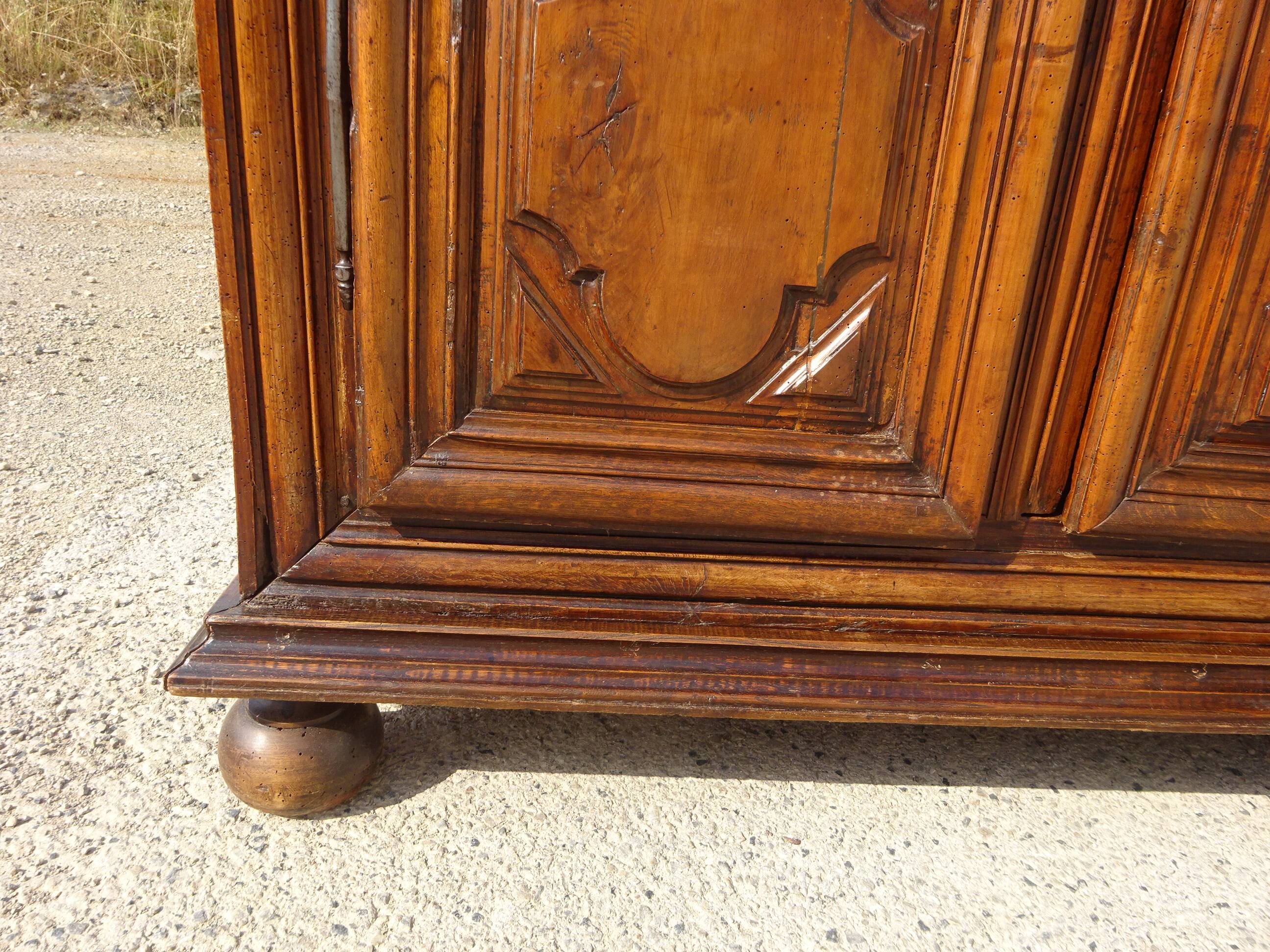 Antique Louis XIII wardrobe in solid walnut