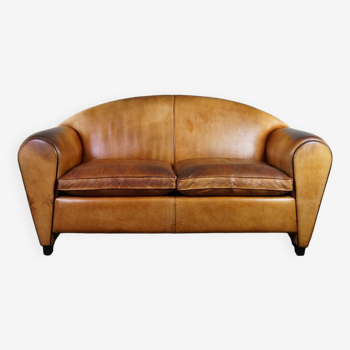 Bart van Bekhoven sheep leather 2-seater design sofa in a beautiful light honey color