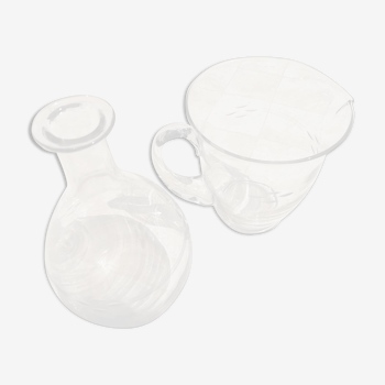Set of a wine decanter and a glass water pitcher