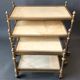 Neoclassical nesting trolleys in gilded brass and peach marble 1950/1960.