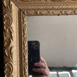 Old small baroque mirror with mercury tin