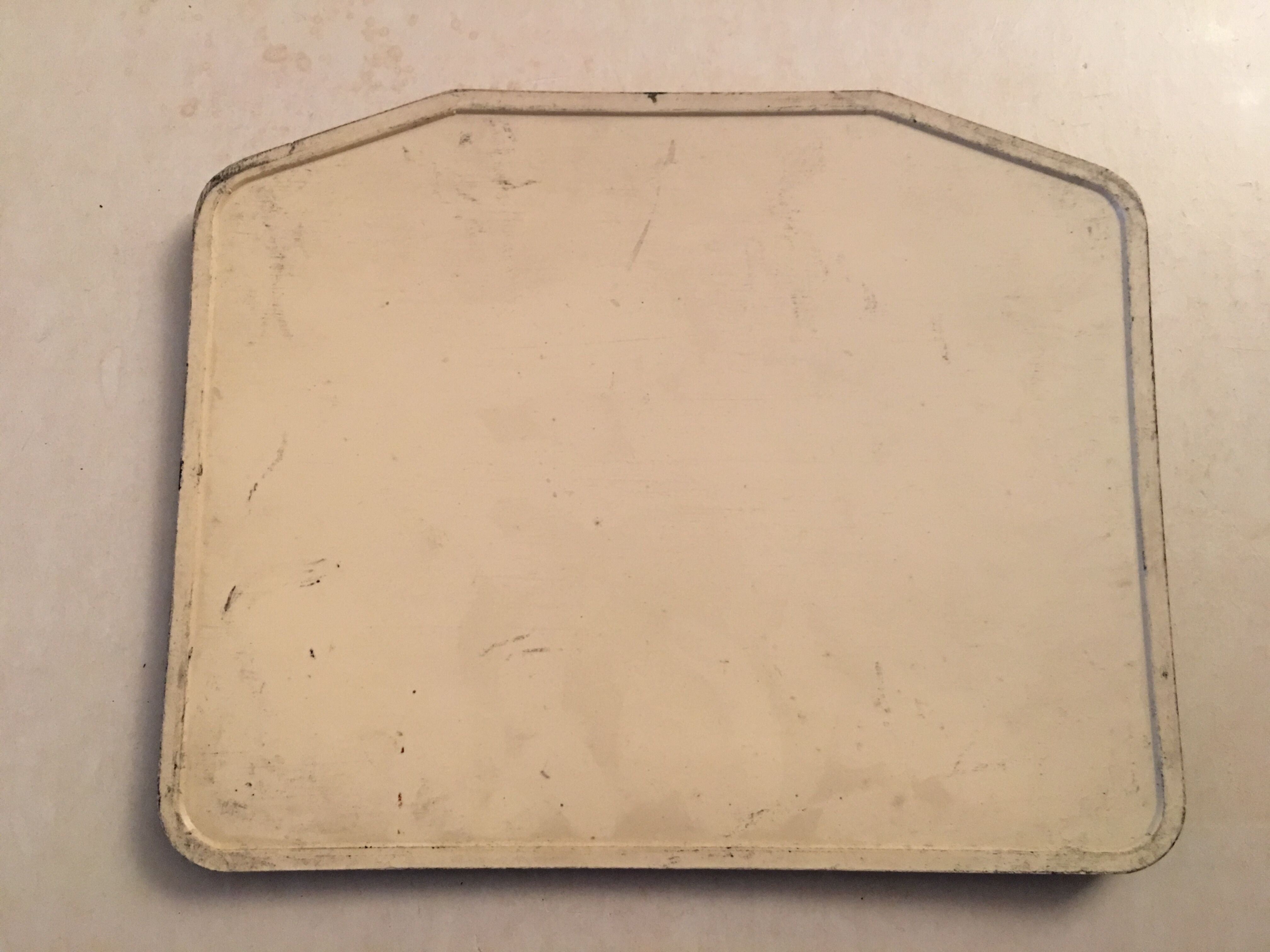 Old plate of bakelite, no. 12 bus line.