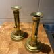 Pair of 19th-century brass pusher candlesticks