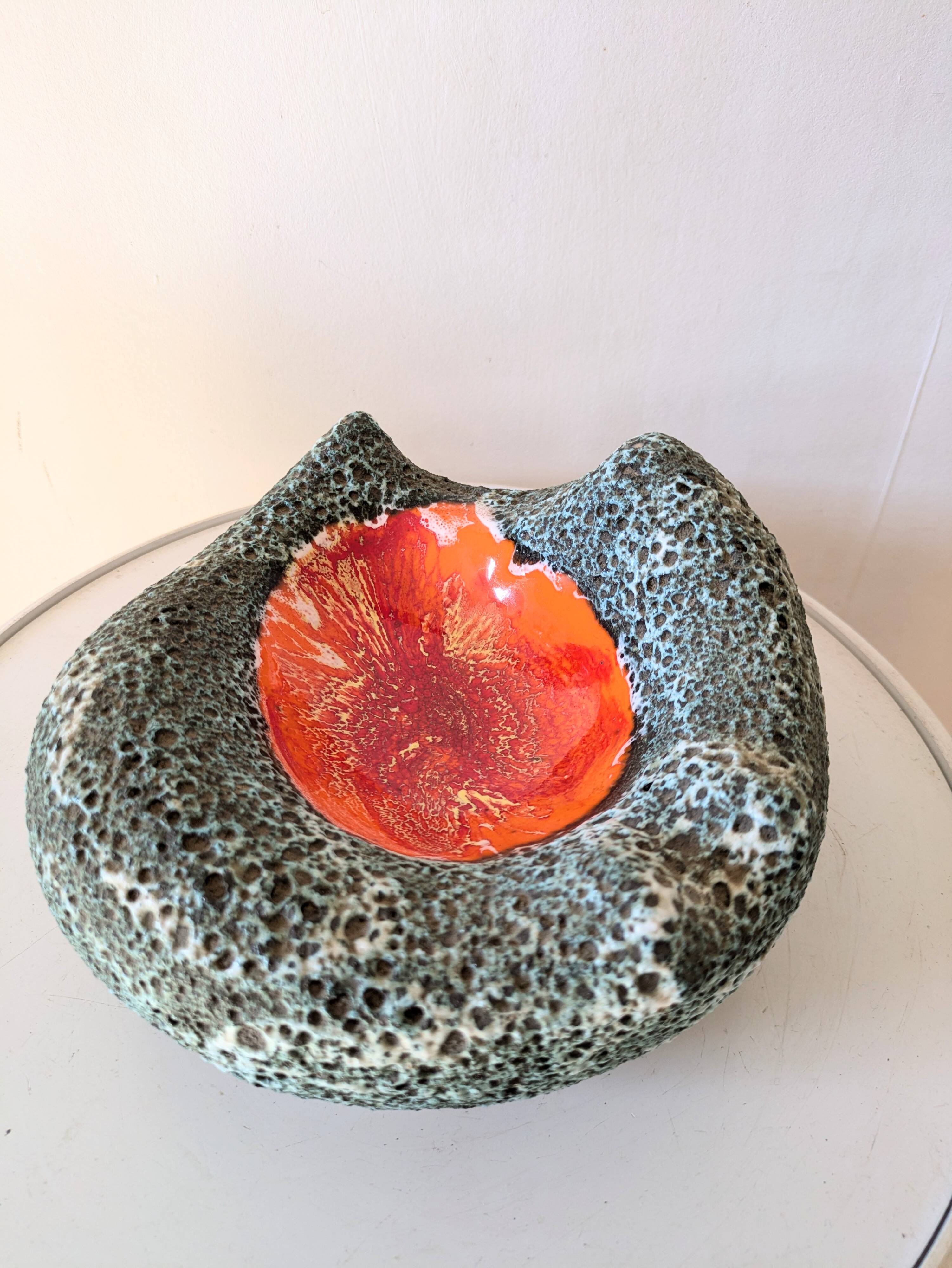 Volcanic lava pocket emptier, 70s design