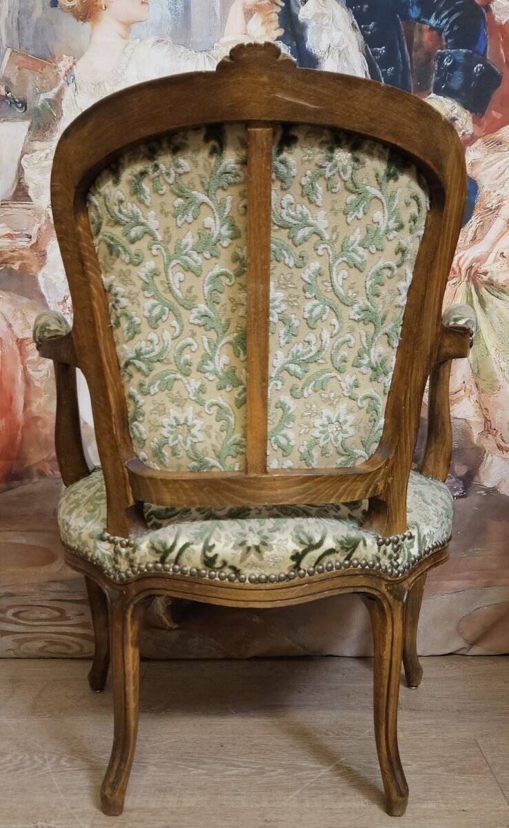 Louis XV style armchair, accompanied by its matching footrest.