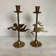 Pair of brass Christmas angel and reindeer candle holders