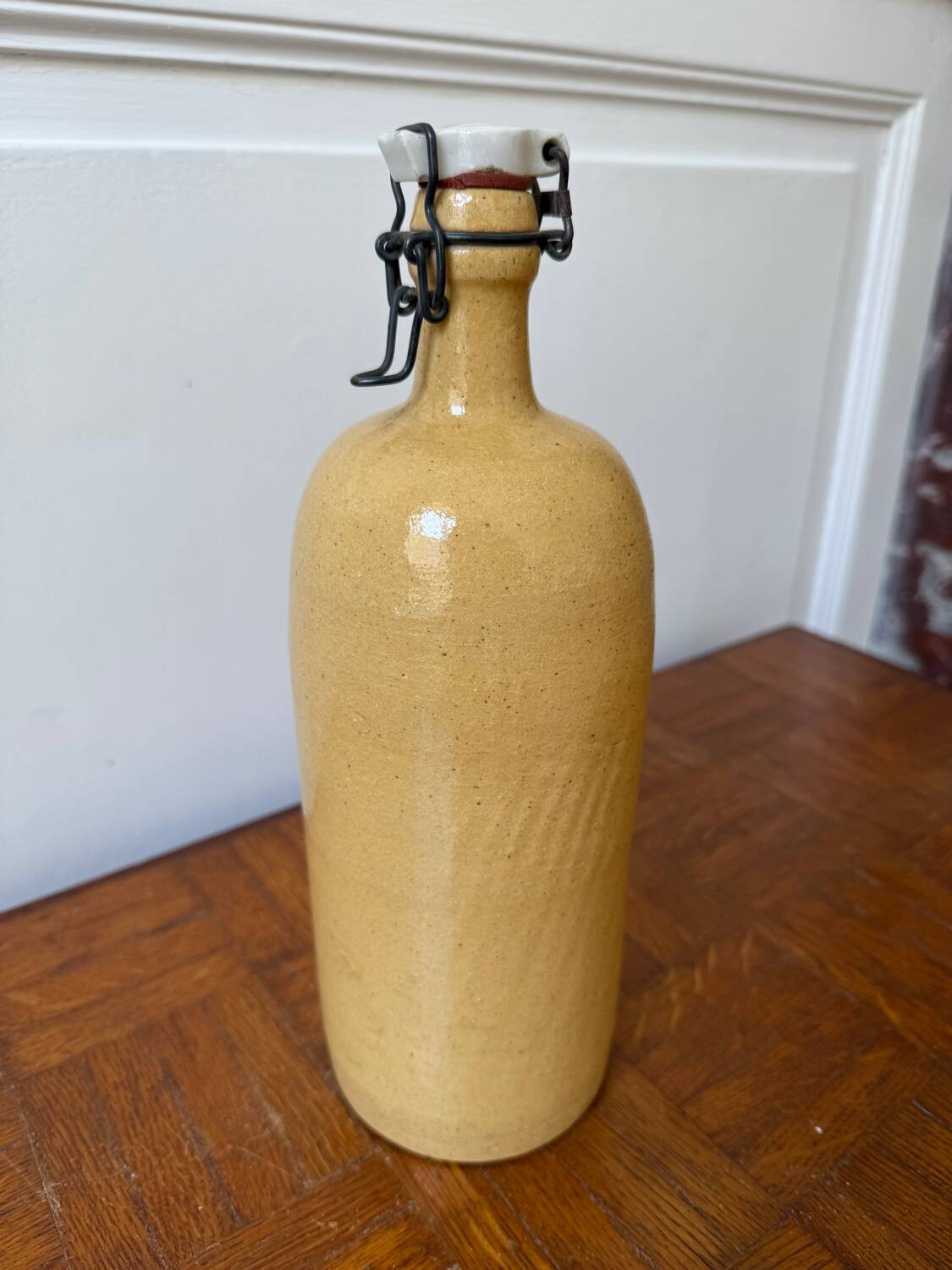 Vintage yellow stoneware bottle