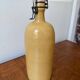 Vintage yellow stoneware bottle