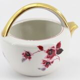 Antique porcelain teapot pourer