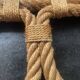 vintage wall coat rack in braided rope