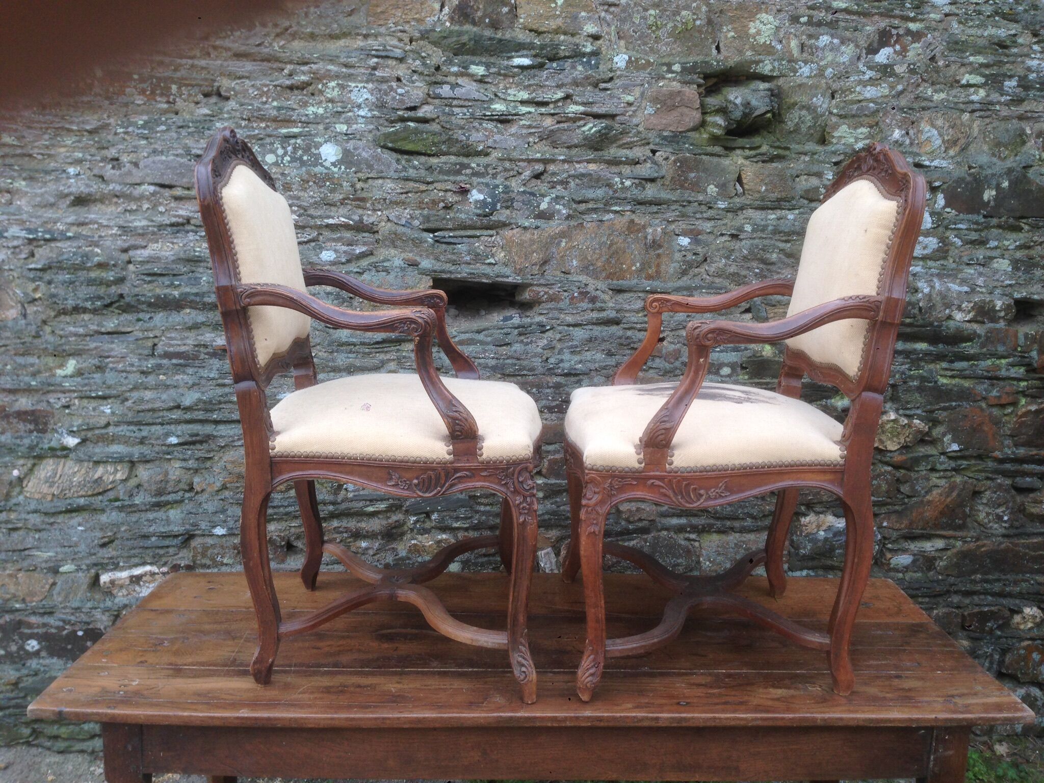 Pair of Louis XV-style walnut armchairs