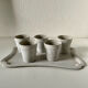 Tray and 5 antique brass liqueur glasses