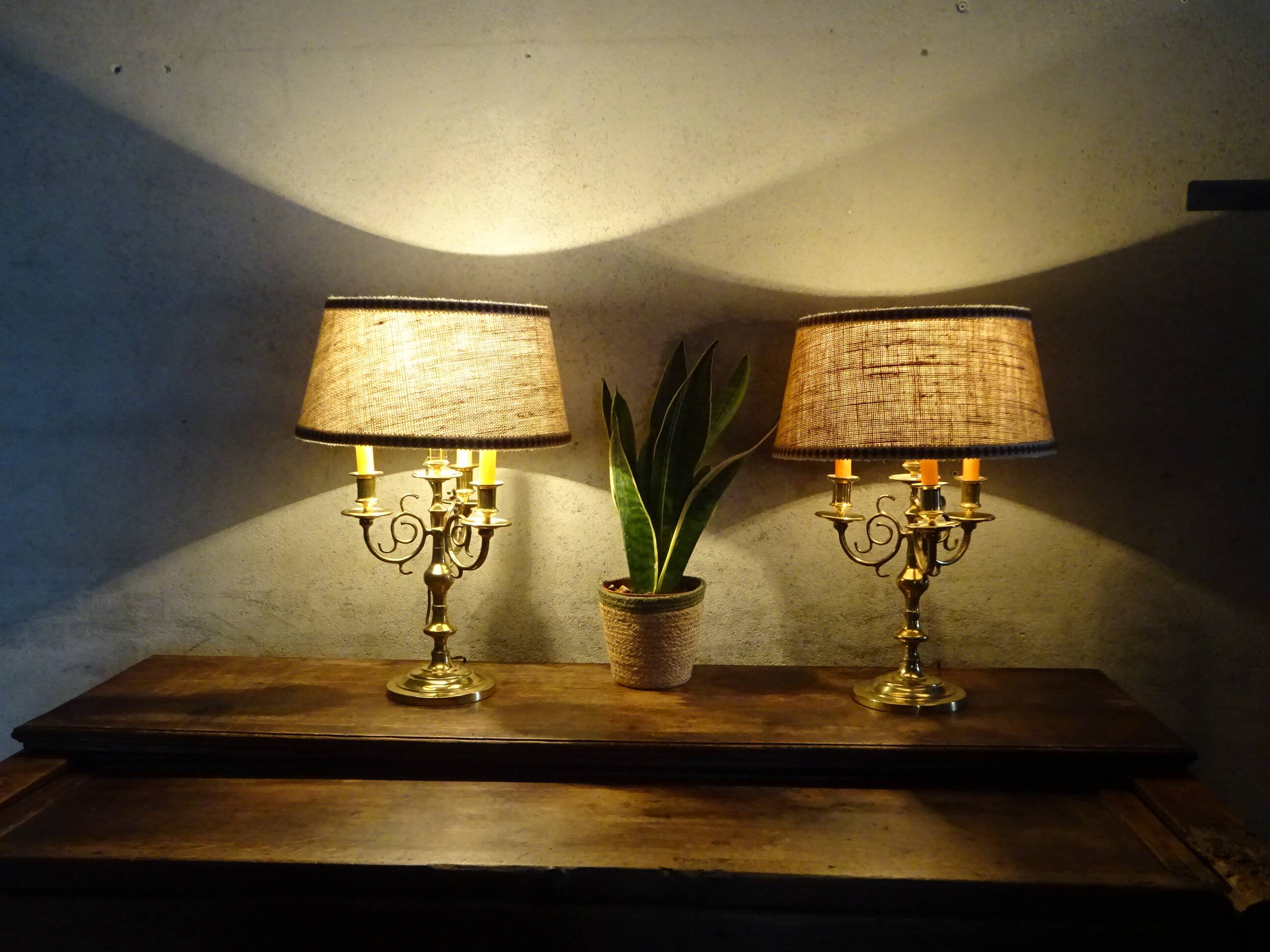 Copper candlesticks adapted as bedside lamps, the pair.