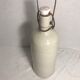 Old bottle enamelled sandstone
