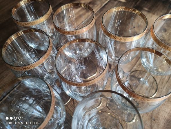 Set of 9 water or red wine glasses in crystal curled and gilded edging