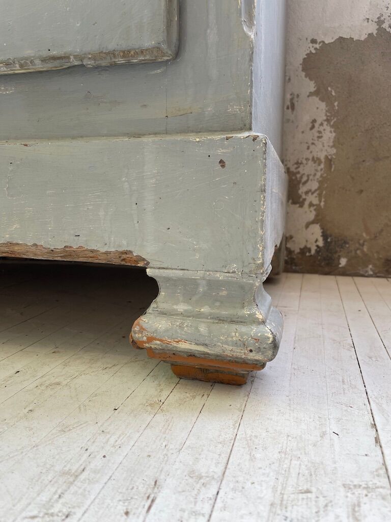 Blue patinated cap cabinet