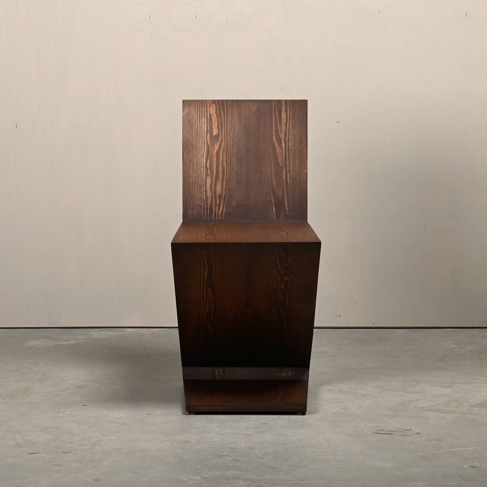 Gerrit Rietveld Zig Zag Chair is dark brown stained wood