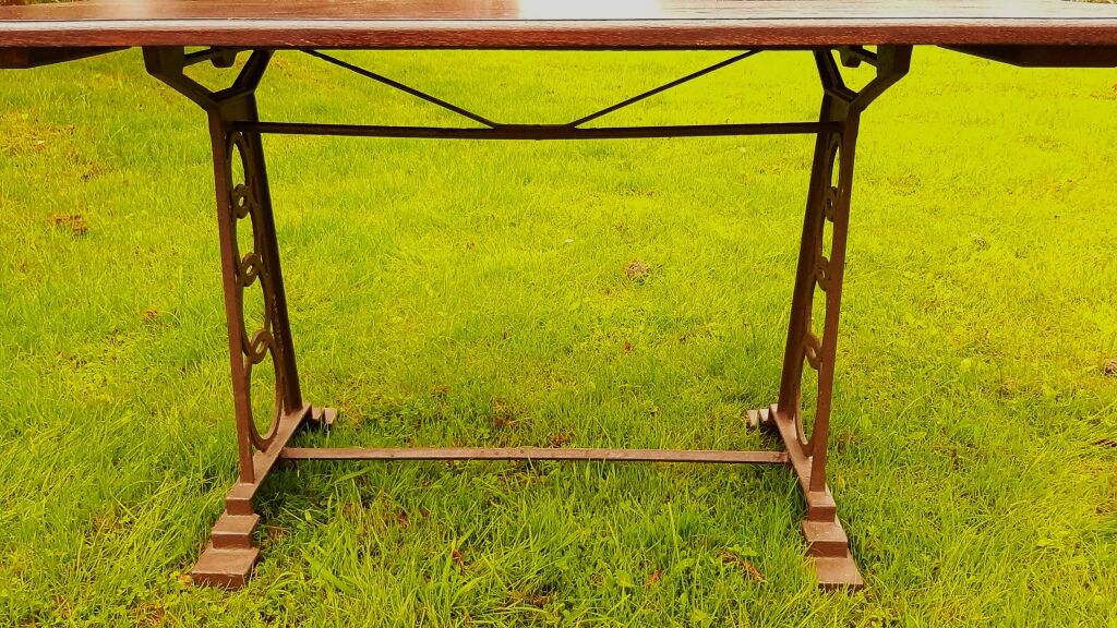 Bistro table, art deco cast iron feet, wood tray