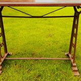 Bistro table, art deco cast iron feet, wood tray