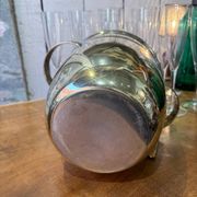 Alpaca champagne bucket from the 1920s with its monopole tongs.