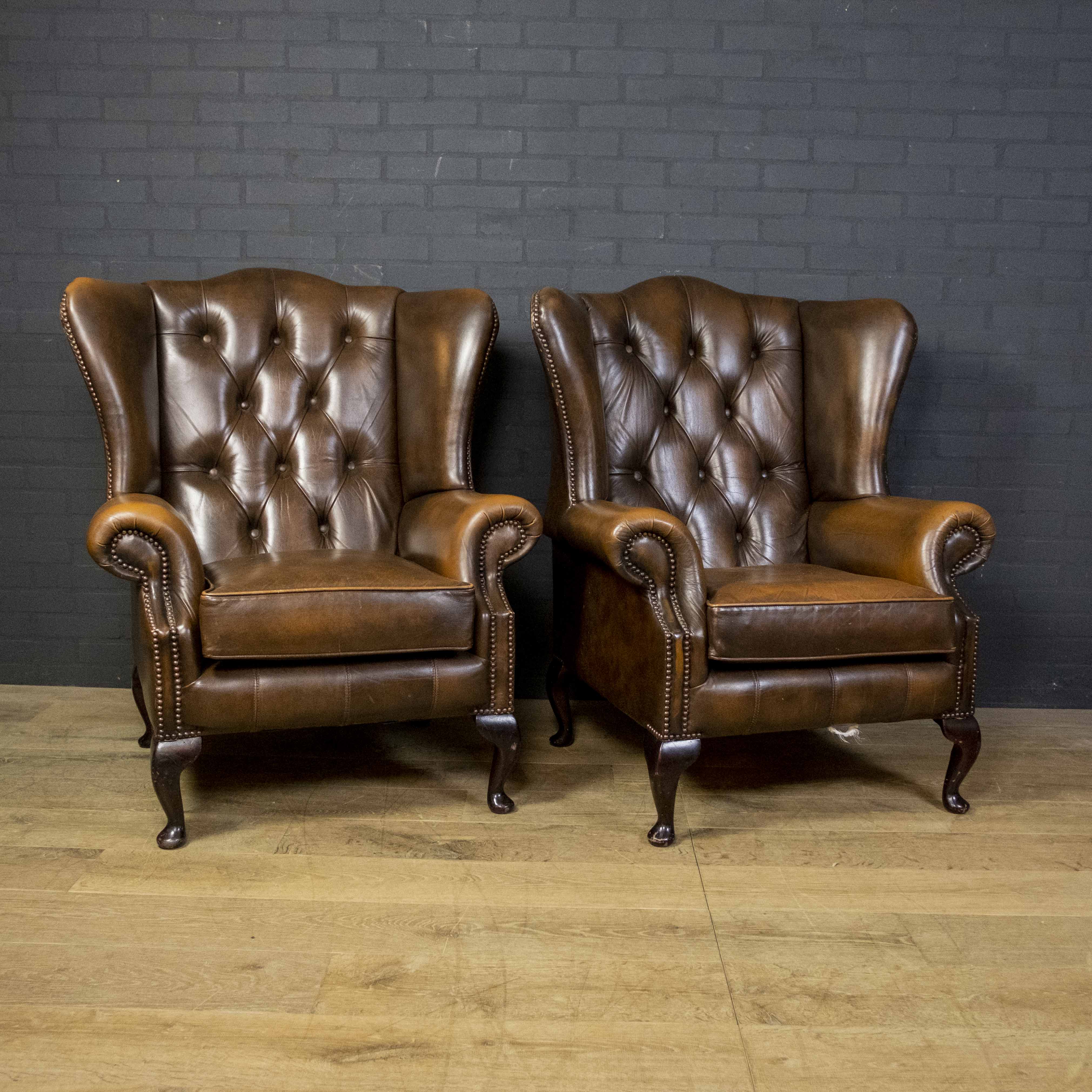 Set of Chesterfield armchairs with footstool
