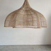 Huge rattan suspension in the shape of a corolla H:1m; D: 1m50