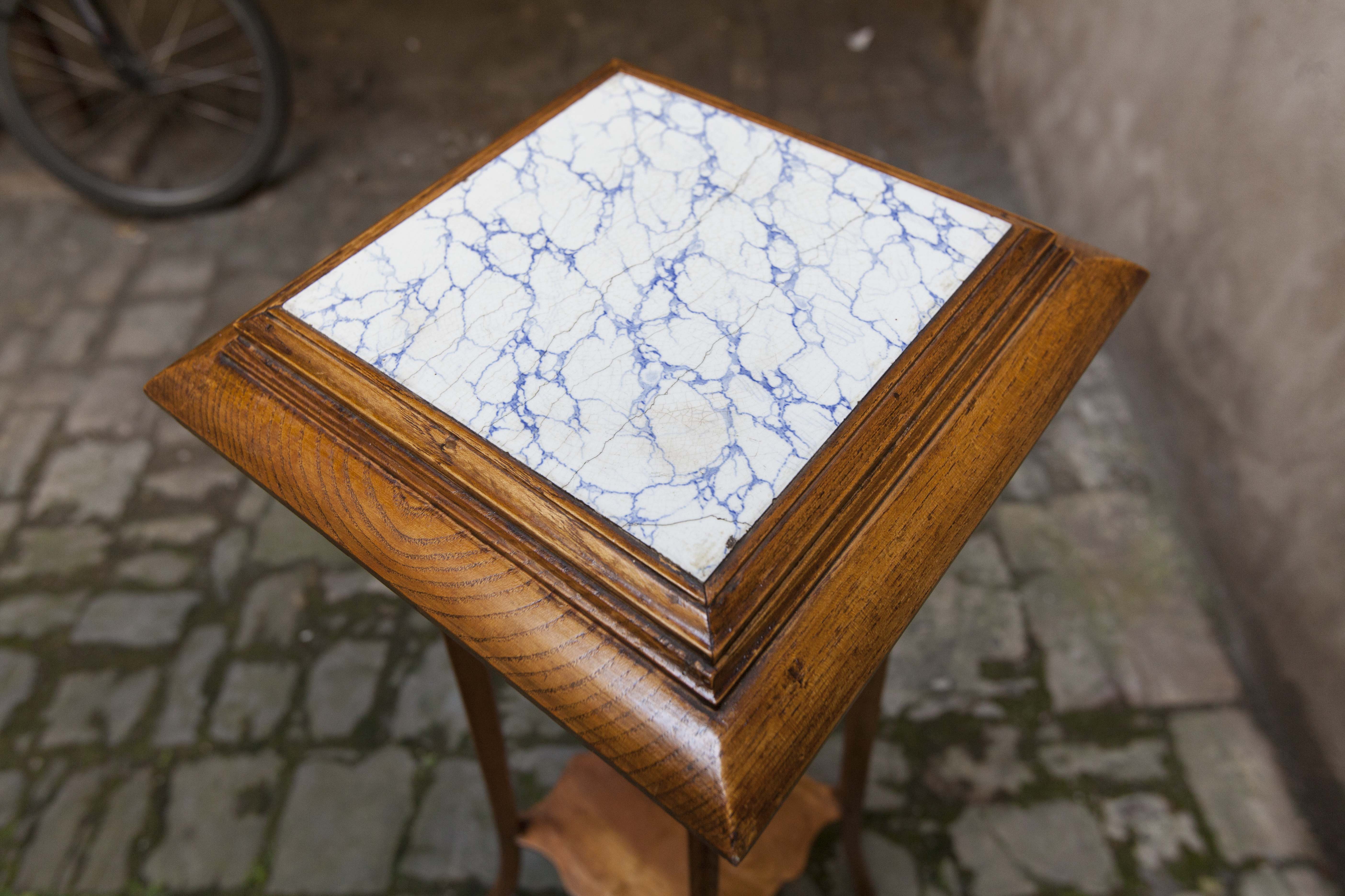 Wooden and ceramic sellette, 1920