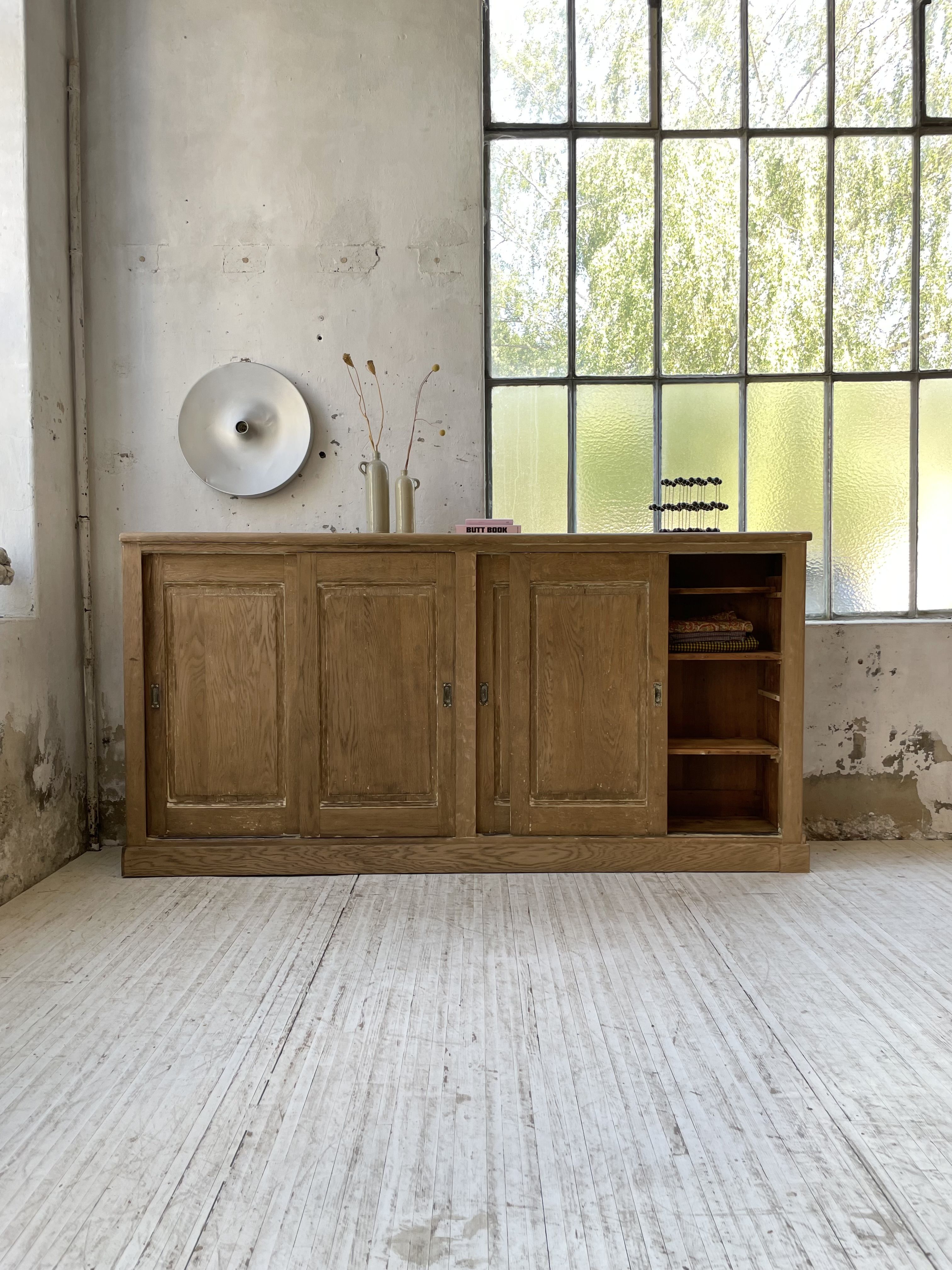 Large row of solid oak loom sliding doors