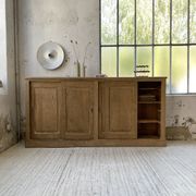 Large row of solid oak loom sliding doors