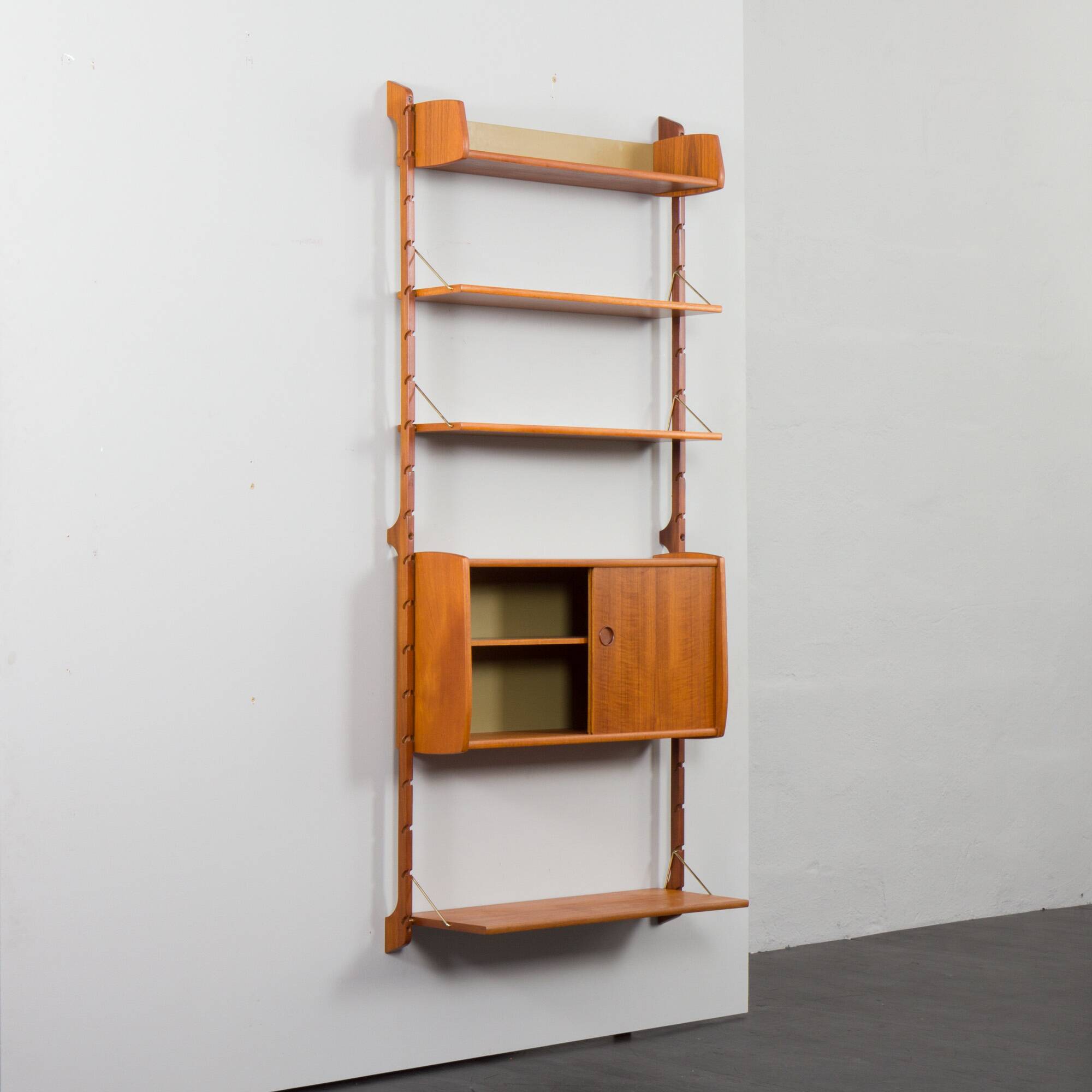 Scandinavian modern wall shelving system Ergo in teak by J. Texmon, Norway, 1960s
