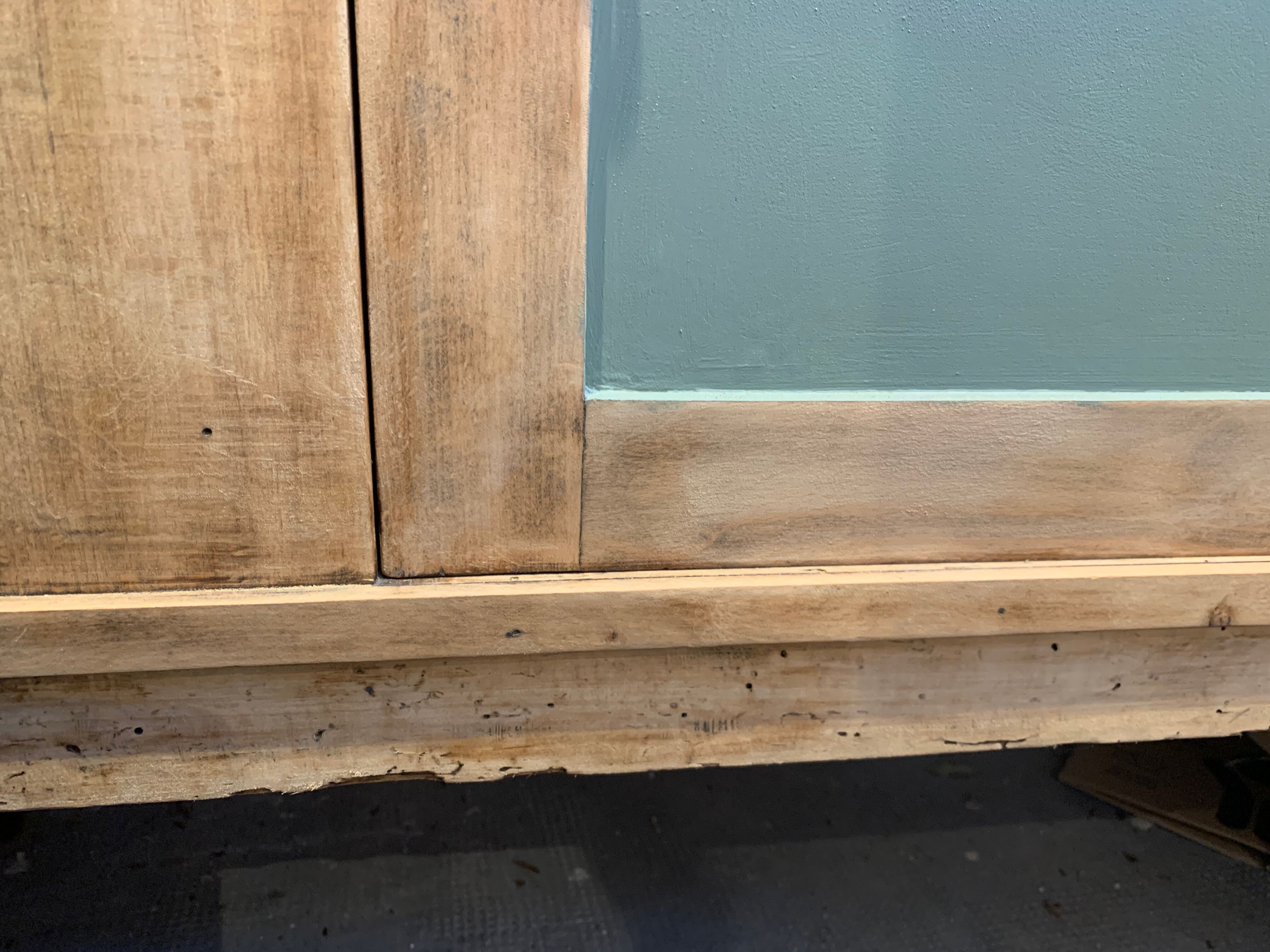 Green buffet and raw wood