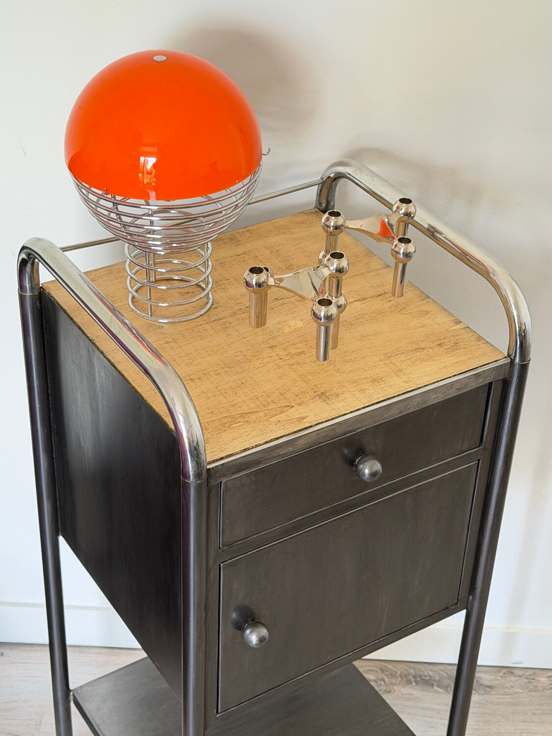 Vintage bedside table in brushed metal
