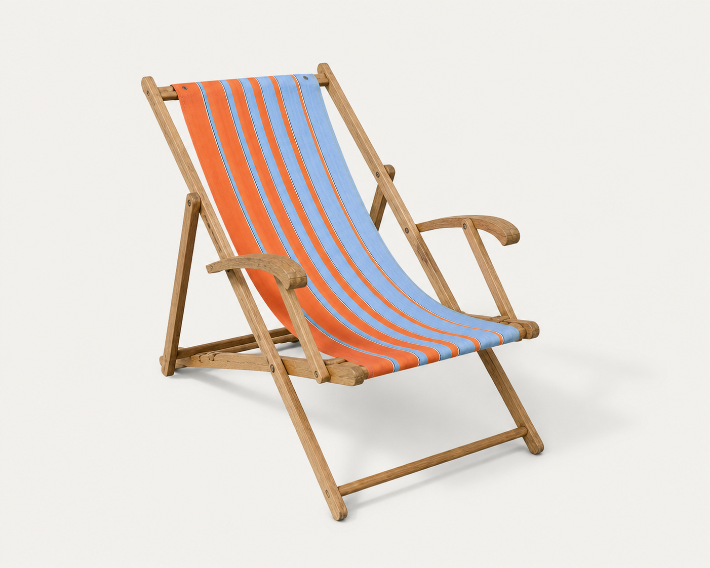 Vintage deck chair with orange and blue striped fabric, original patina.