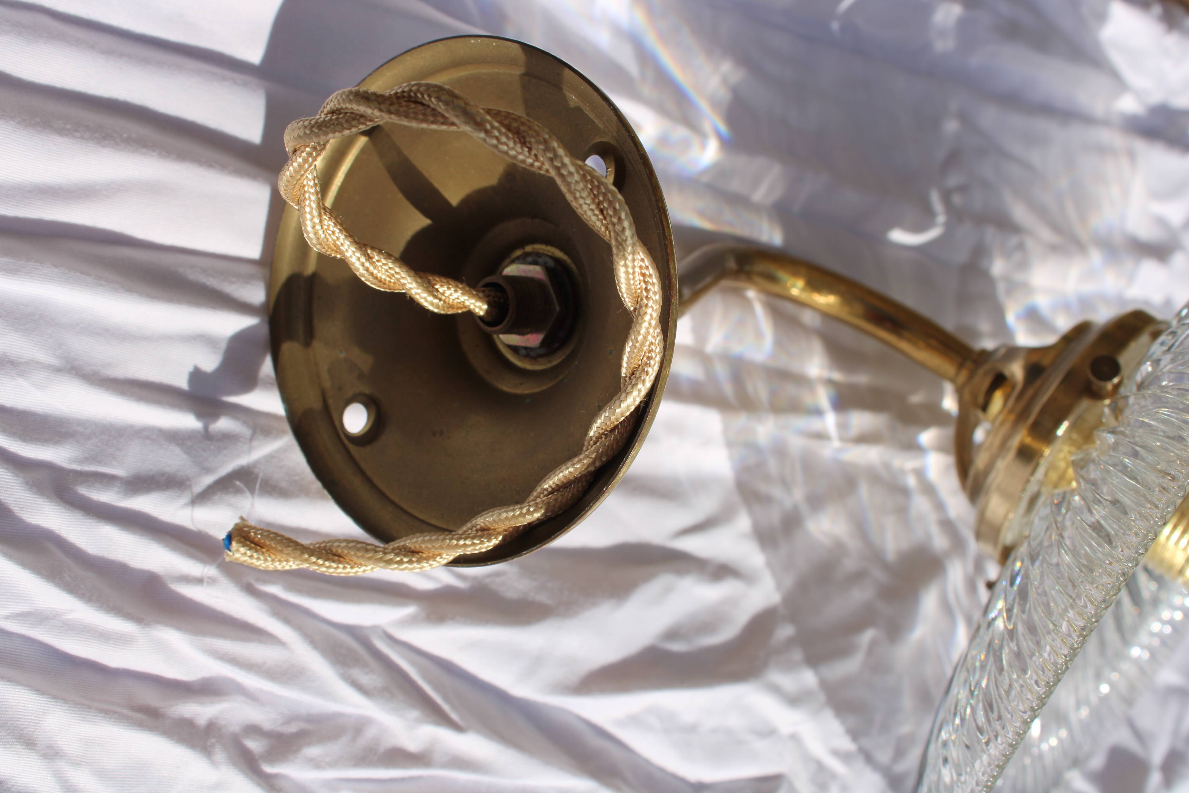 Holophane glass and brass wall light