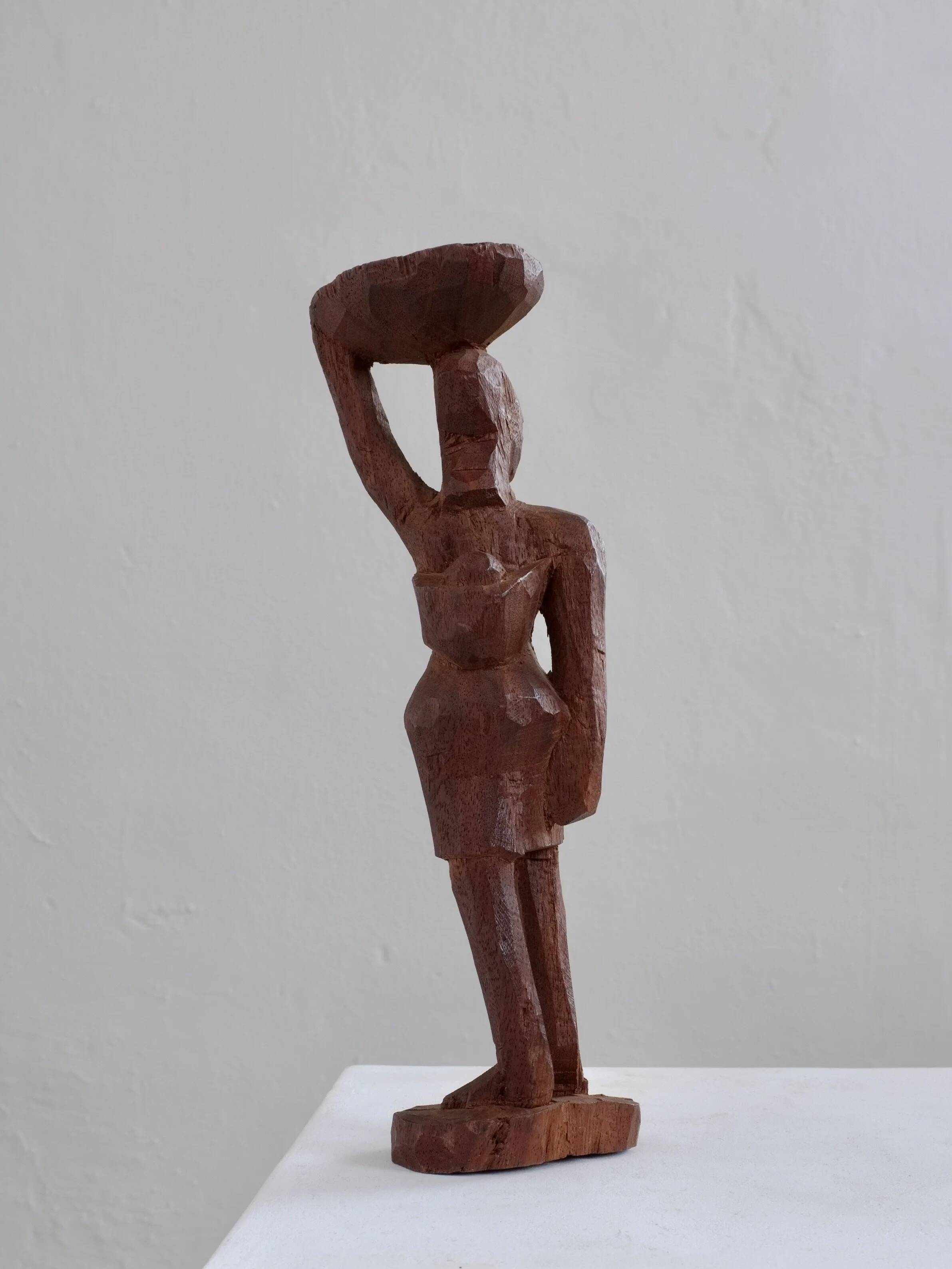 Mid-century hand-carved African woman sculpture