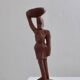 Mid-century hand-carved African woman sculpture