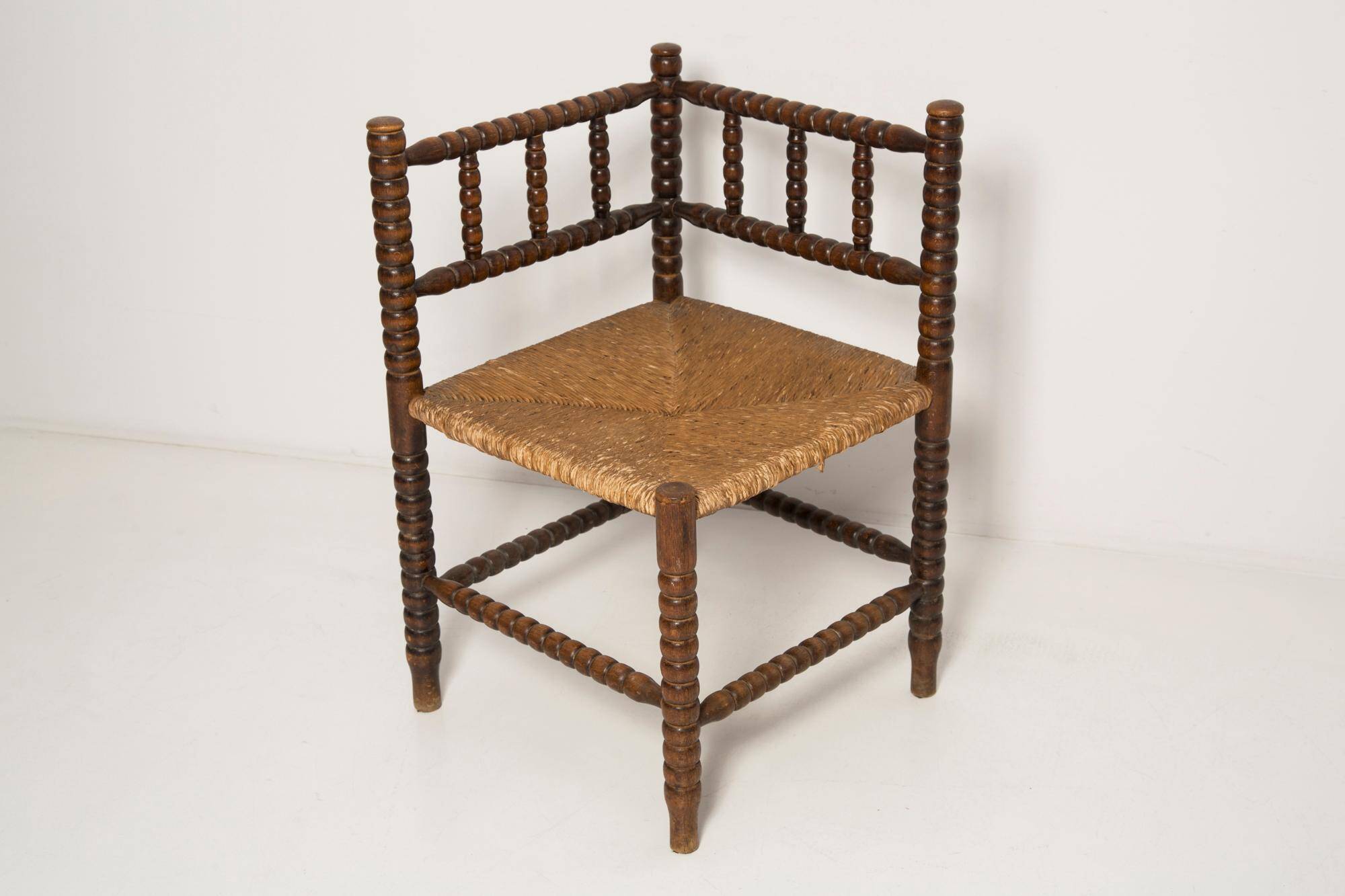 Provincial antique bobbin corner chair from the mid-century, France, 1940s.