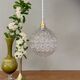 Suspension globe vintage en verre moulé