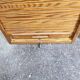 Industrial oak tambour cabinet from the 1930s, portable shape.