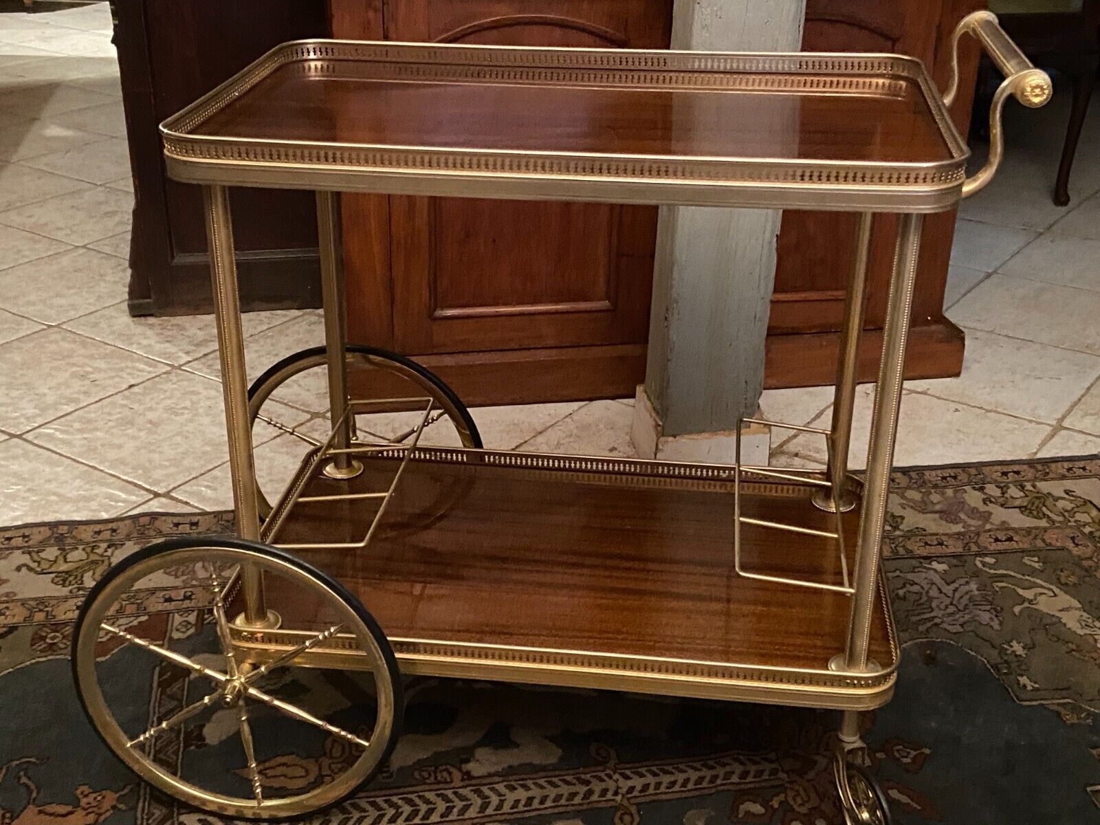 Servant table in gilded metal and mahogany mid-twentieth century