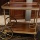 Servant table in gilded metal and mahogany mid-twentieth century