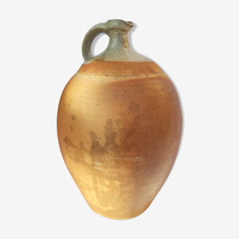 Ancient terracotta and sandstone jug