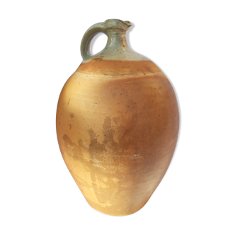 Ancient terracotta and sandstone jug